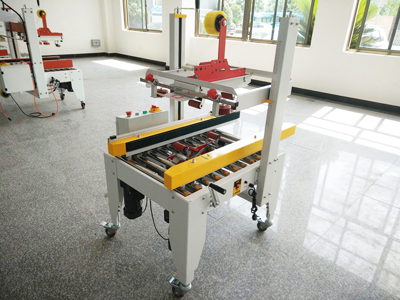 JS-FXZ500B 左(zuǒ)右驅動(dòng)配聯線(xiàn)手動自(zì)動折蓋(gài)膠帶封(feng)箱機